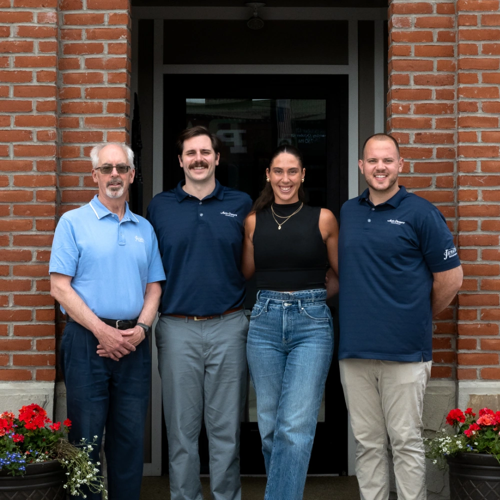 The team at the New York office of the law firm Kennedy, Kennedy & Kennedy poses together for a group photo.